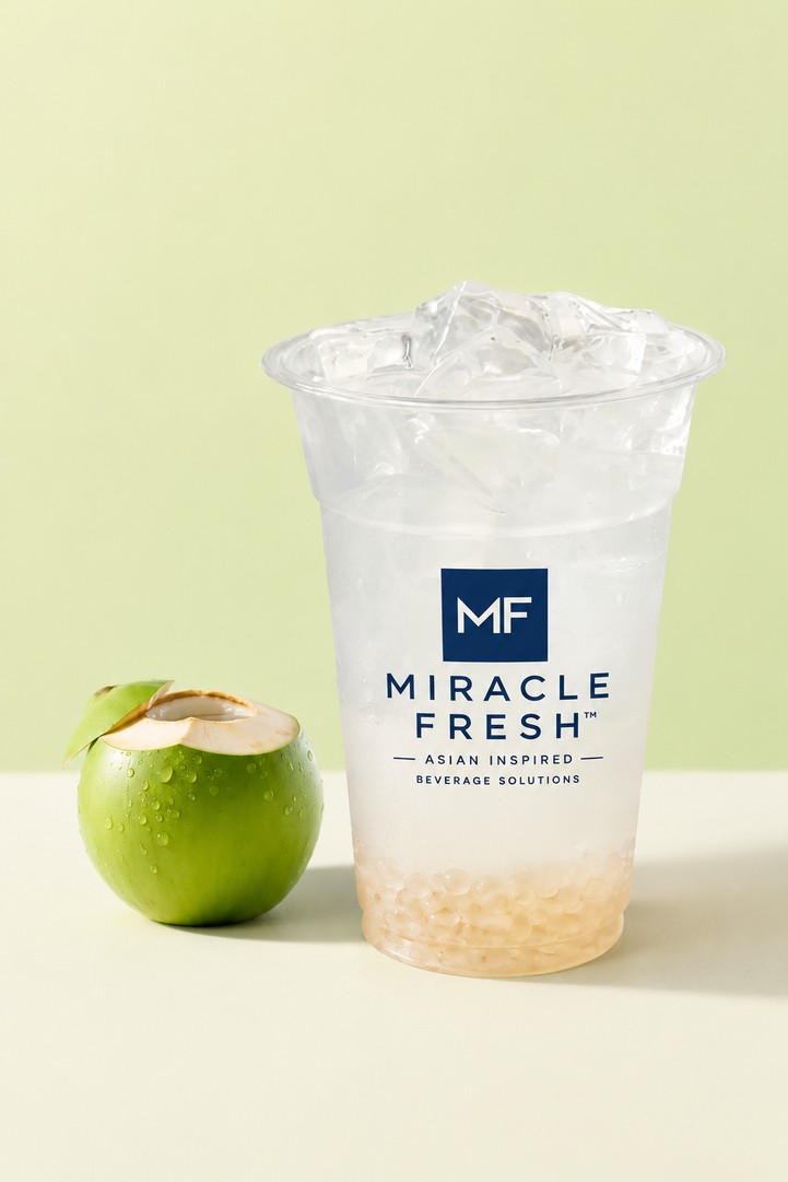 Oat Popping Boba Coconut Water served in a Miracle Fresh cup