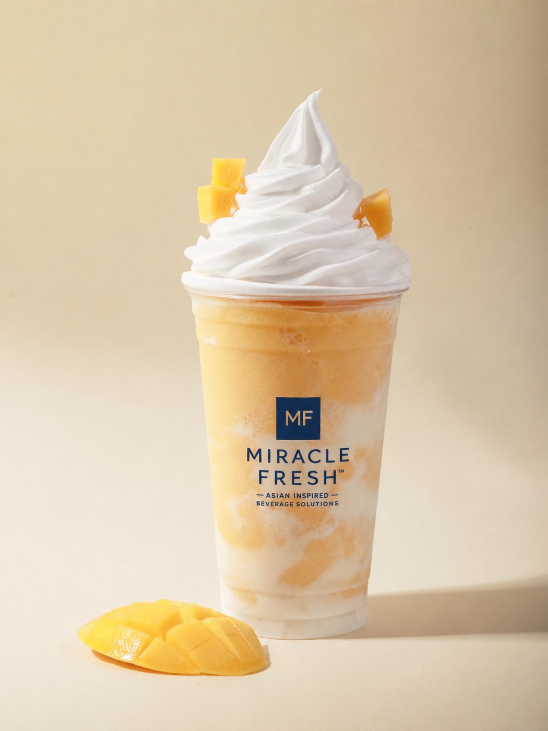 Mango coconut swirl slush topped with soft-serve ice cream