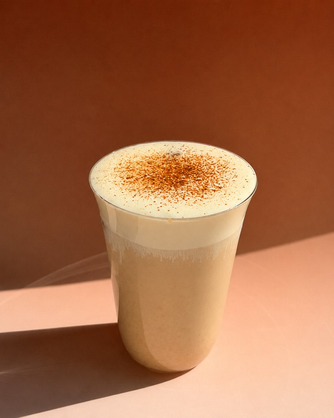 Roasted yellow tea and rye milk with cheese foam and soybean powder