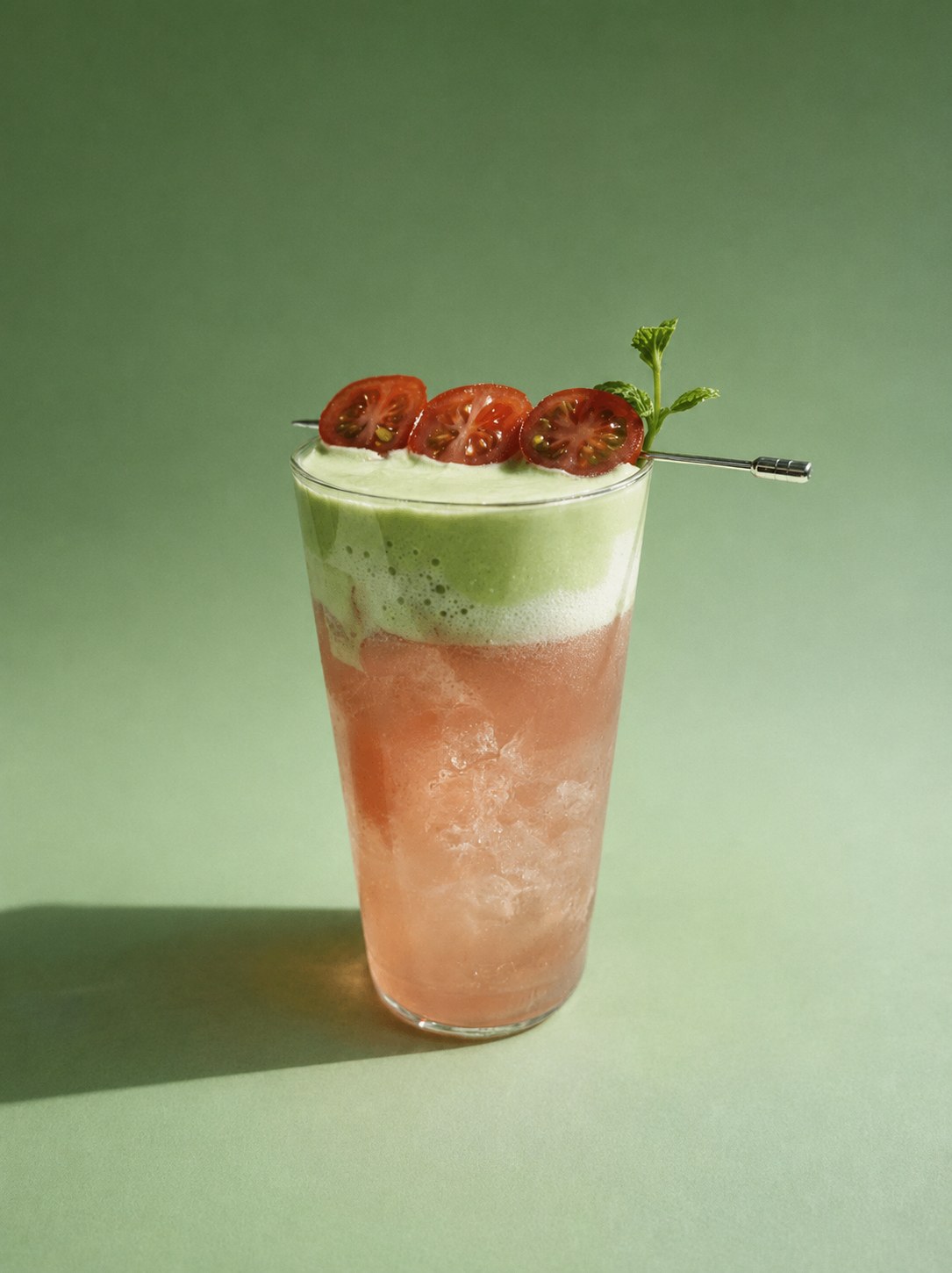 Cherry tomato, red apple and coconut water topped with matcha foam