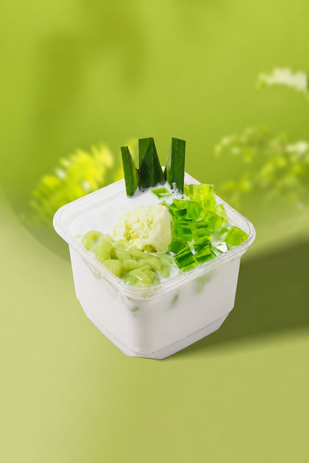 Pandan coconut dessert bowl with jelly, rice noodles and ice cream