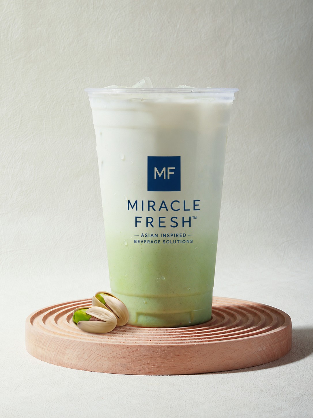 Sea-salt pistachio coconut drink in a clear cup